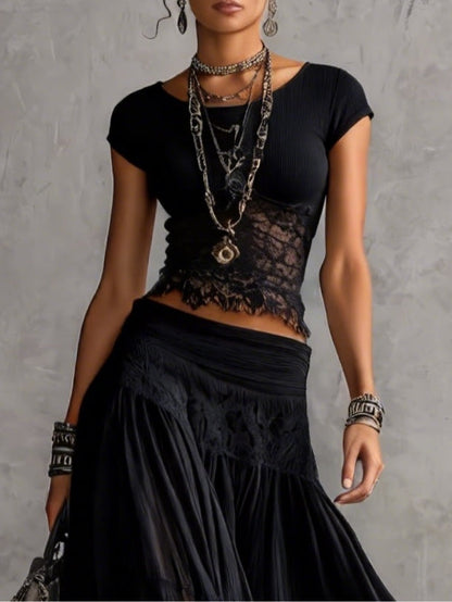 Ginevra · Set composto da top trasparente con pannelli in pizzo nero e gonna maxi plissettata