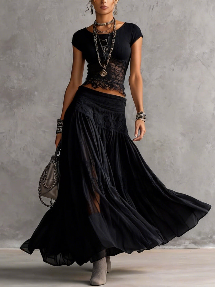 Ginevra · Set composto da top trasparente con pannelli in pizzo nero e gonna maxi plissettata